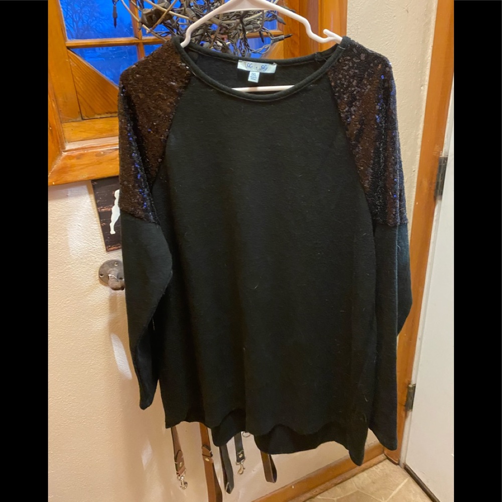 Black sweater with black sequined shoulders